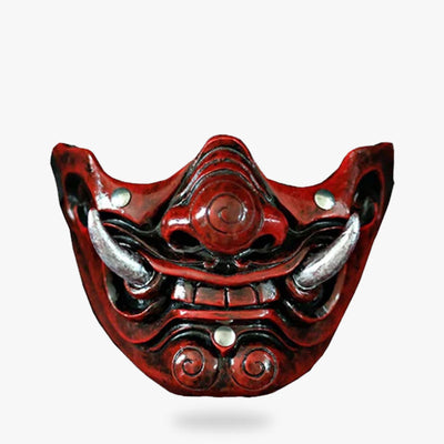 The half samurai mask is handmade with red painting. It represents half face from japanese oni demon