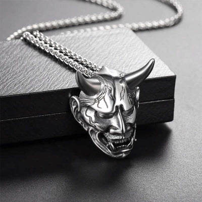 Hannya pendant showing a Japanese jewelwy with a demon Oni Face and a chainless