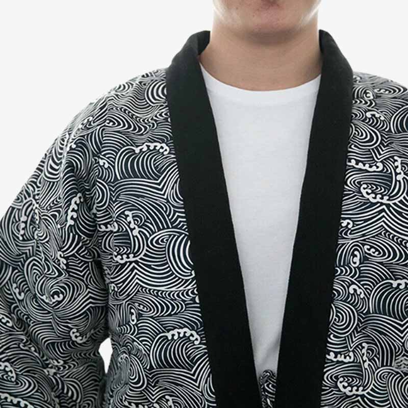A person wearing a hanten jacket for sale with Japanese traditional wave pattern