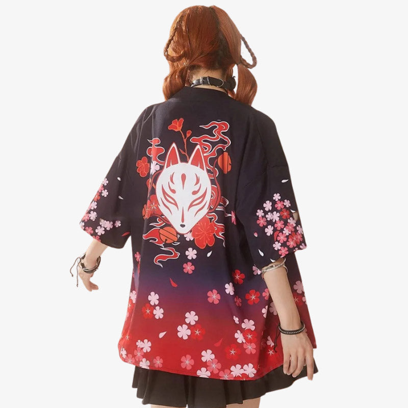 Haori jackets for women from Japan, blending cultural heritage with modern fashion kistune mask desgin and sakura flowers printed on black and red cotton material for versatile outerwear.