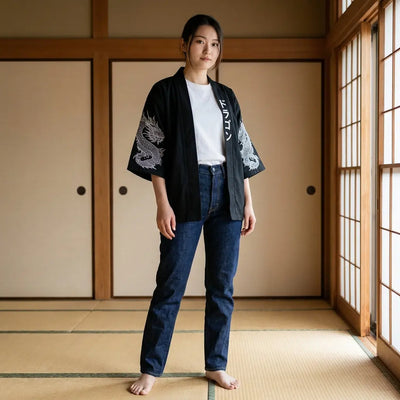 Woman wearing a dragon haori in a washitsu room with tatami and shoji screens