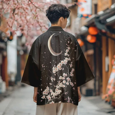 a man is dressed with a Haori moon style kimono featuring lunar-inspired designs and cherry blossom flowers sakura printed, combining tradition with celestial beauty.