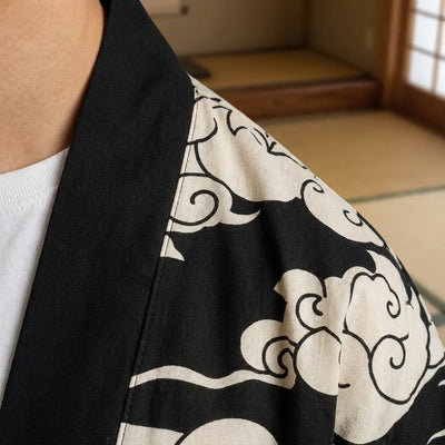 Close-up of the printed fabric and sleeve of a black haori jacket