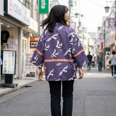 Woman seen from behind wearing a haori tokyo in a Harajuku street