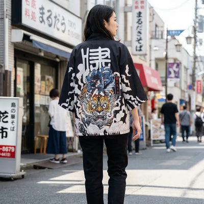 Woman seen from behind wearing a manga kimono in a Harajuku street