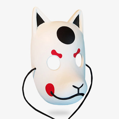 This white japanese kitsune mask is handmade by an artist. The japanese fox mask has red and black colore on the face