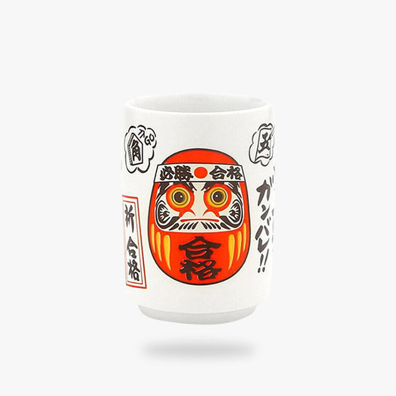 The Japan tea cups feature a vibrant red Daruma motif, perfect for enjoying tea with a touch of cultural significance and charm