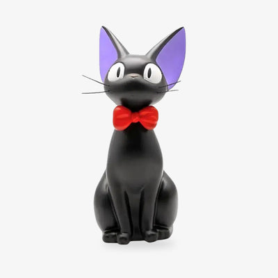 A black Japanese cat figurine with a red ribbon and blue painted ears. This manga deco object is inspired by the work of Isao Takahata in style and form.