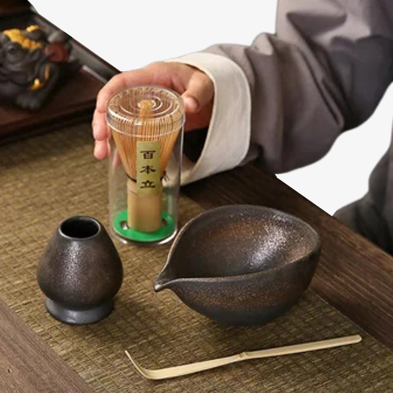 This a full tea set composed by a Japanese ceramic matcha bowl, a must-have for tea enthusiasts seeking authentic matcha preparation. A chasen and chashaku