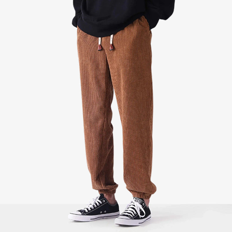 Japanese corduroy pants featuring a retro-inspired design material with durable textured fabric, blending traditional craftsmanship and modern streetwear style.