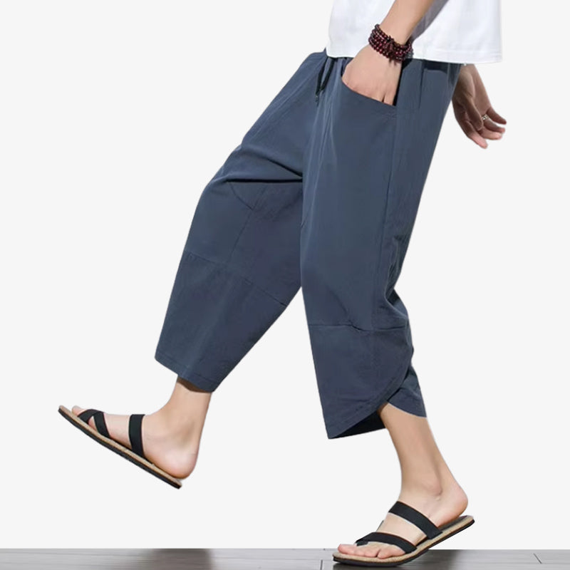 Japanese cropped pants for men offering a relaxed wide-leg fit, ideal for casual and trendy fashion.