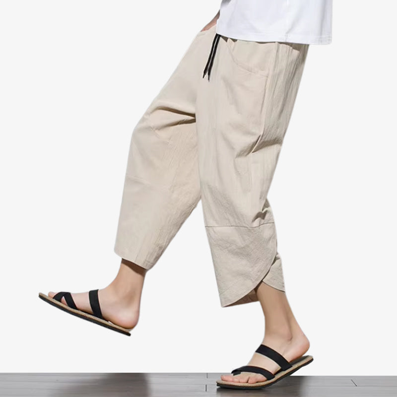 this beige colored Japanese cropped pants designed with a wide-leg fit and inspired by minimalism from Japan for modern casual wear.