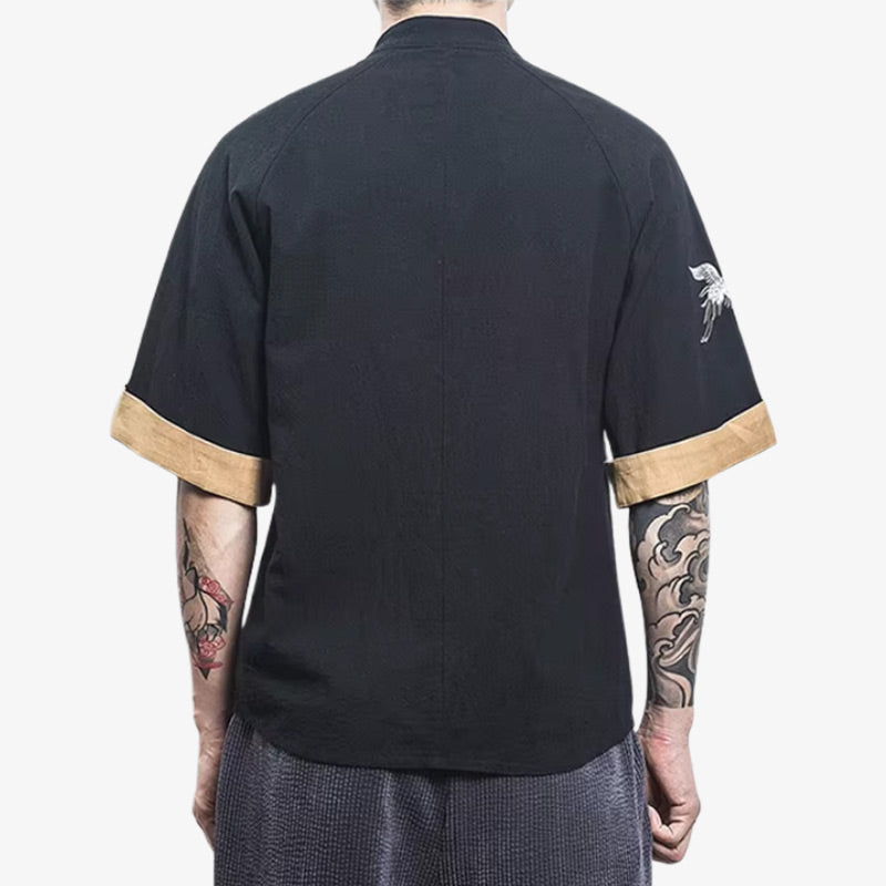 a man i dressed with Japanese embroidered t-shirt featuring stitched traditional elements, offering a premium and artisanal take on casual wear.