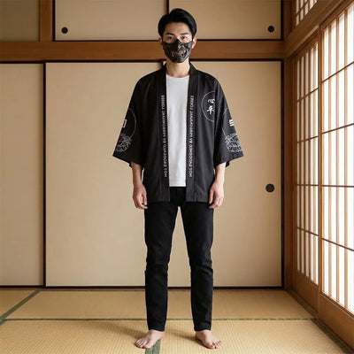 Man wearing a haori style jacket in a traditional Japanese washitsu room, front view