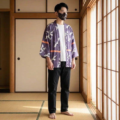 Man wearing a haori tokyo in a traditional Japanese washitsu room, front view