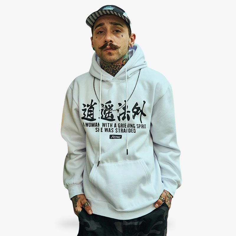 a man is dressed with a Japanese kanji hoodie with white color and black japanese letters