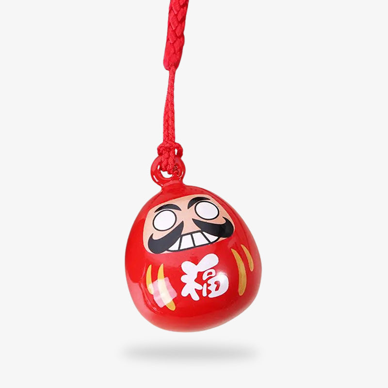 This Japanese keychain charm showcases a Daruma design, a classic symbol of resilience and good fortune in Japanese culture