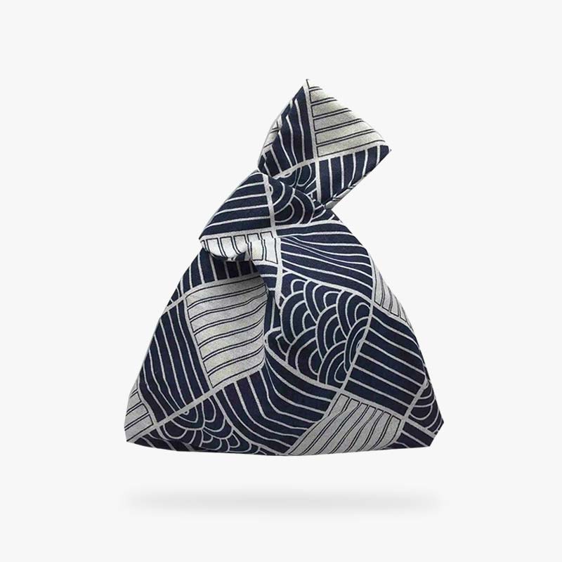 This japanese knot bag pattern is a kimono bag. It is an all-purpose bag worn on women's wrists. Create your own stylish accessory with our japanese knot bag pattern, perfect for crafting enthusiasts looking to embrace Japanese minimalism