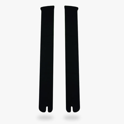 A pair of japanese long school socks for women. Color of those long tabi socks is black and material is cotton