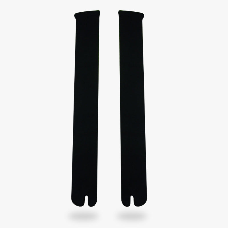 A pair of japanese long school socks for women. Color of those long tabi socks is black and material is cotton