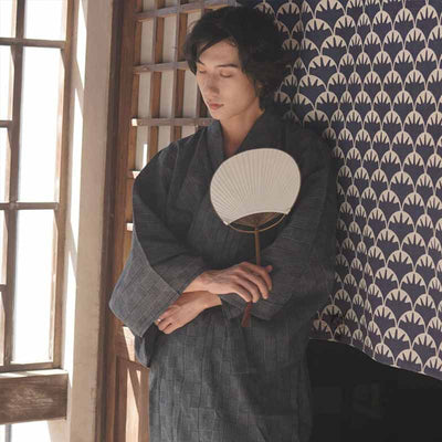 Look the Japanese male samurai kimono real photo backside. He hold a white japanese fan Uchiwa in his hands