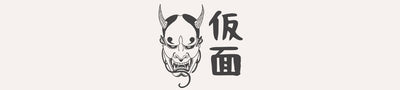 A japanese mask logo with a kanji meaning Kamen