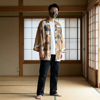 Man wearing a haori yukata in a traditional Japanese washitsu room, front view