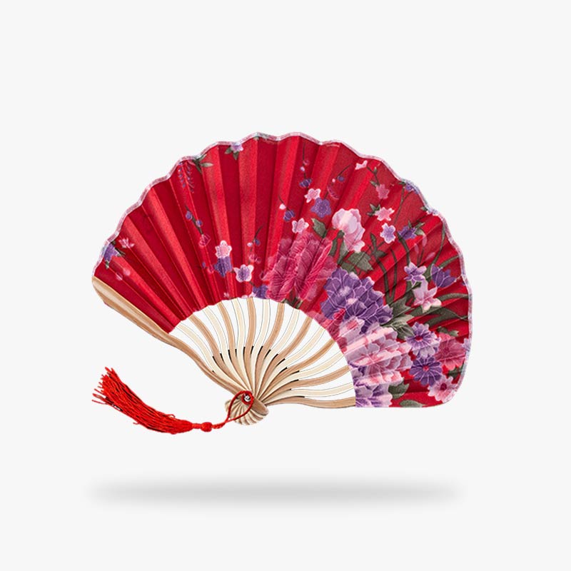 This Japanese red fan features a beautiful floral motif, combining traditional elegance with vibrant colors for a stunning accessory.