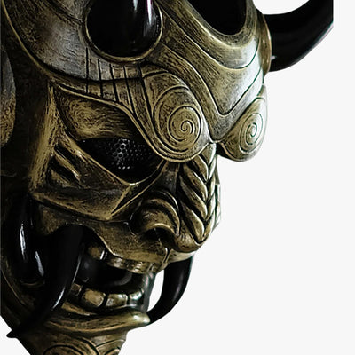The gold colored Japanese samurai traditional mask is a handcrafted piece, made from fiberglass and wood, depicting the legendary Oni demon with hand-painted details, horns, and sharp black teeth
