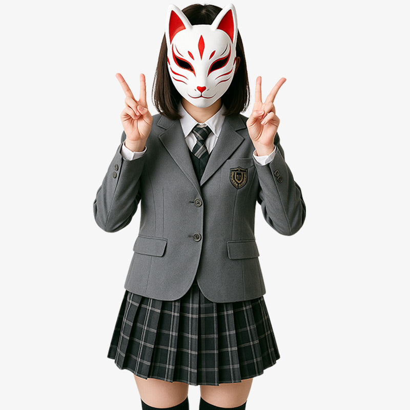 A person wearing a Japanese school uniform, consisting of a blazer, white shirt, plaid skirt, and tie, and also sporting a Japanese fox mask.