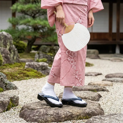 Japanese Shoe worn with a pink kimono in a Japanese garden
