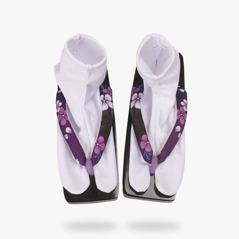 A pair of white Japanese socks tabi. The kimono socks with Japanese geta sandals for women with sakura flower pattern