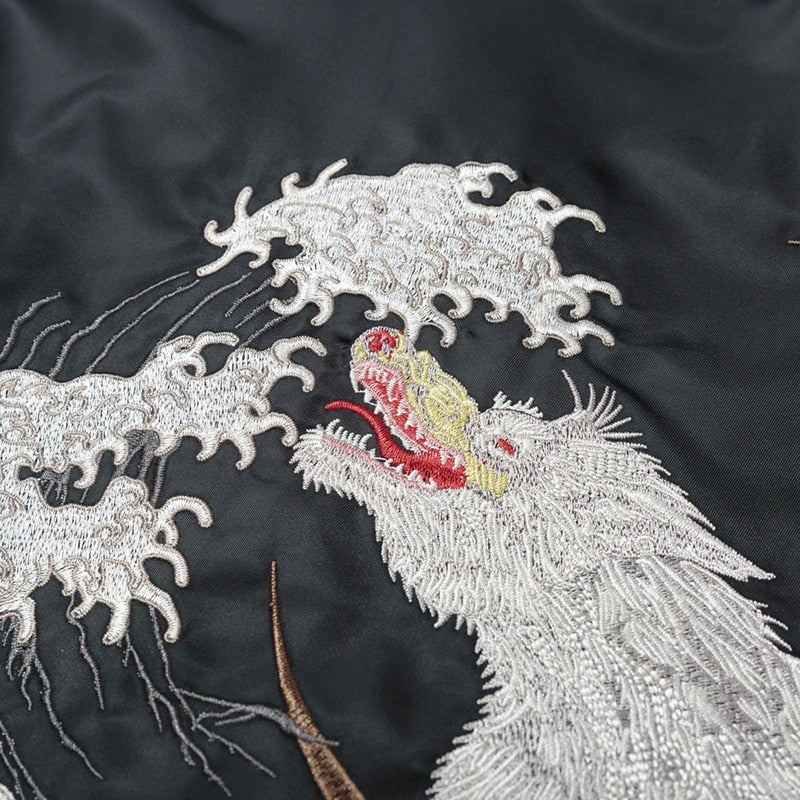 Embrace the spirit of the wilderness with our Japanese souvenir jacket wolf, a blend of natural imagery and contemporary style. White wolf embroidered on black japanese bomber jacket