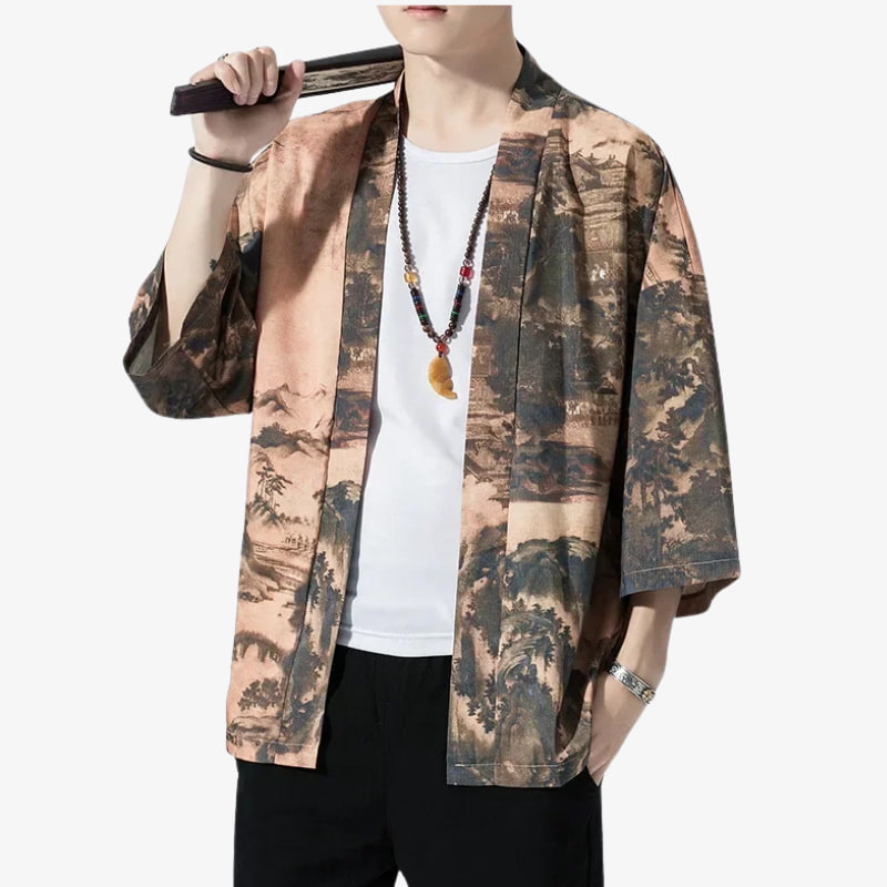 Person wearing a patterned Japanese streetwear kimono style jacket over a white shirt on a white background