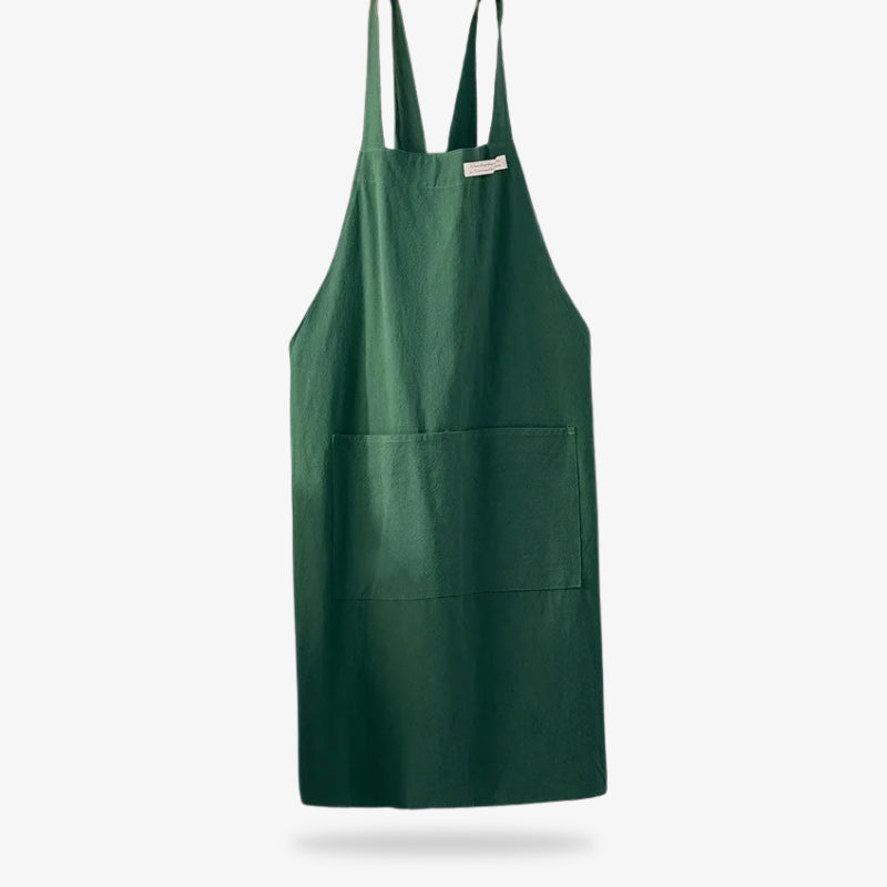Japanese style linen apron blending breathable natural fibers with a cross-back strap design for ease of wear and longevity.