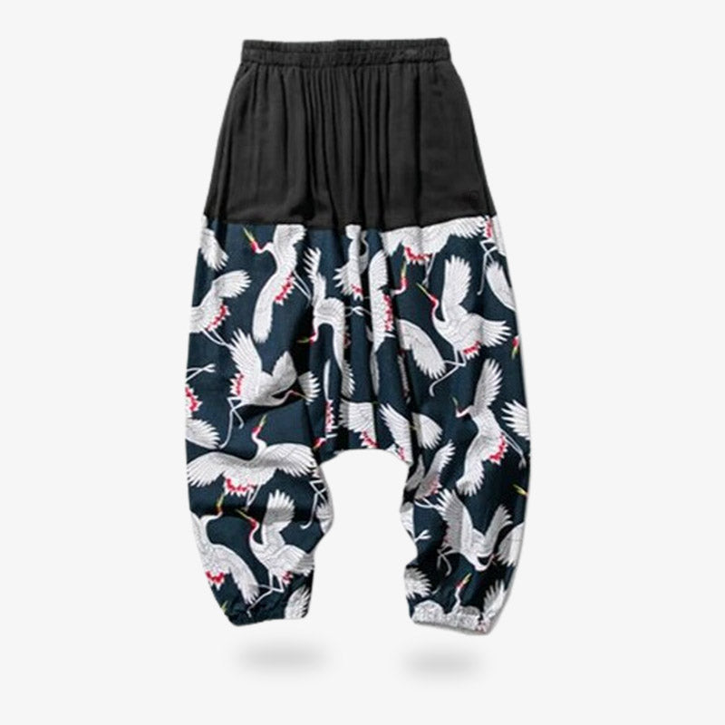 These japanese style pants men are made from a wide cut Japanese sarouel. The fabric is printed with the Tsuru crane symbol. The fabric of the flowing Japanese Pants is comfortable and light