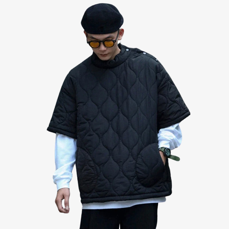 A Japanese style streetwear hoodies in black with quilted fabric. The fashion man wears a black beret and glasses. And a long-sleeved t-shirt