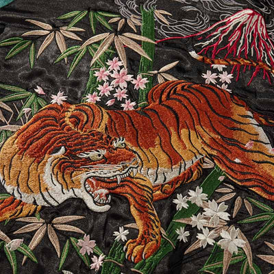 The Japanese sukajan tiger jacket features intricate tiger designs, a symbol of protection and strength in Japanese culture