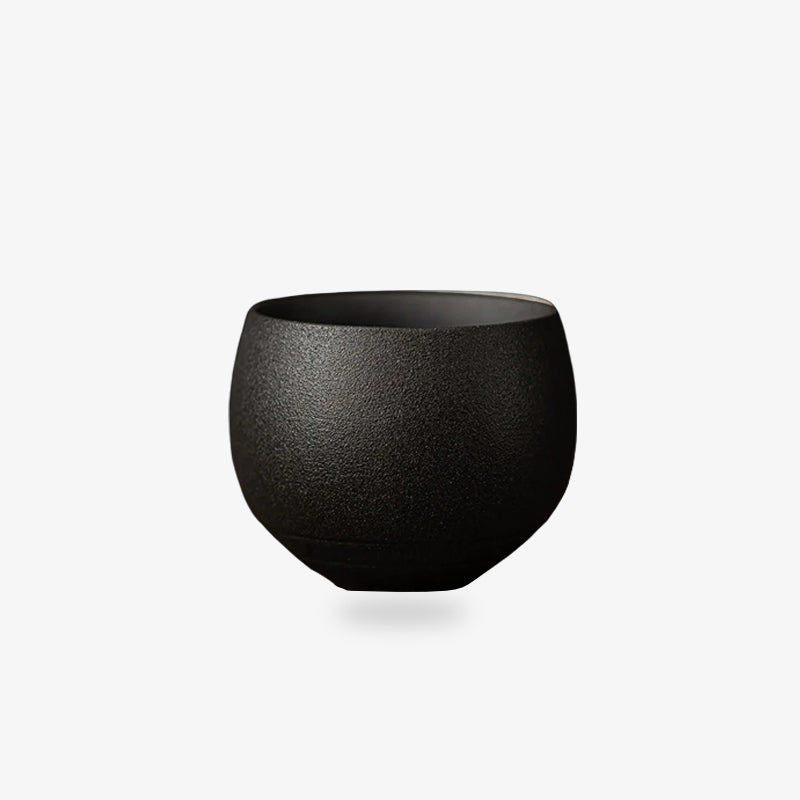 this black Japanese tea cup ceramic is designed with a minimalist aesthetic, crafted for tea enthusiasts and matcha lovers