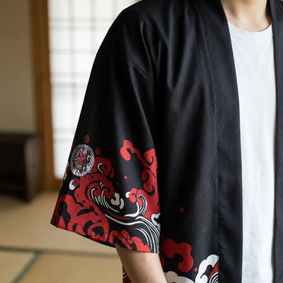 Close-up of the printed fabric and sleeve of a red haori