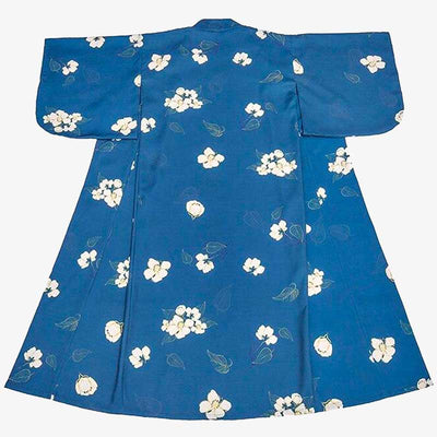 Japanese traditional kimono dress in blue, adorned with delicate flower motifs