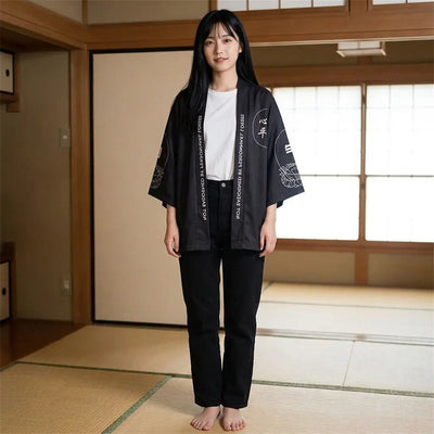 Woman wearing a haori style jacket in a washitsu room with tatami and shoji screens