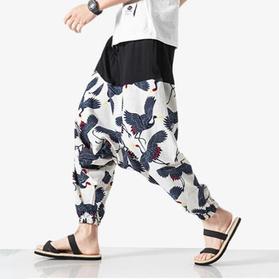 These japanese wide leg pants mens are printed with the mythical Japanese crane motif.