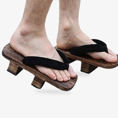 Japanese wooden sandal, classic style with a thong strap.