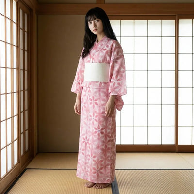 Japanese yukata women in pink with asanoha hemp leaf pattern, front view