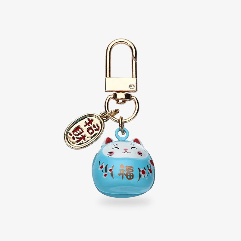 This kawaii cat keychain is sky blue handmade painting with kanji symbols. The coin is gold-plated.