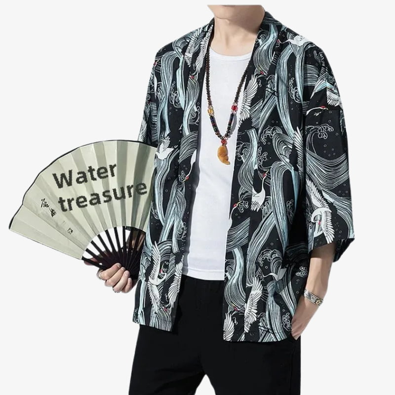 Person wearing a black kimono birds and white patterned kimono holding a fan with 'Water treasure' text.