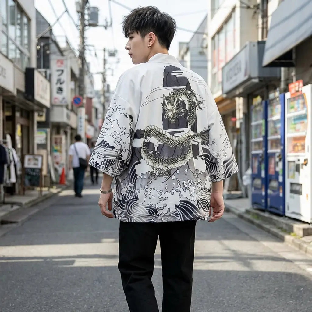 Back view of a kimono dragon worn in a Harajuku street, showing the full print