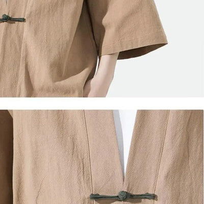 Close-up of a beige kimono haori coat with a button on a white background