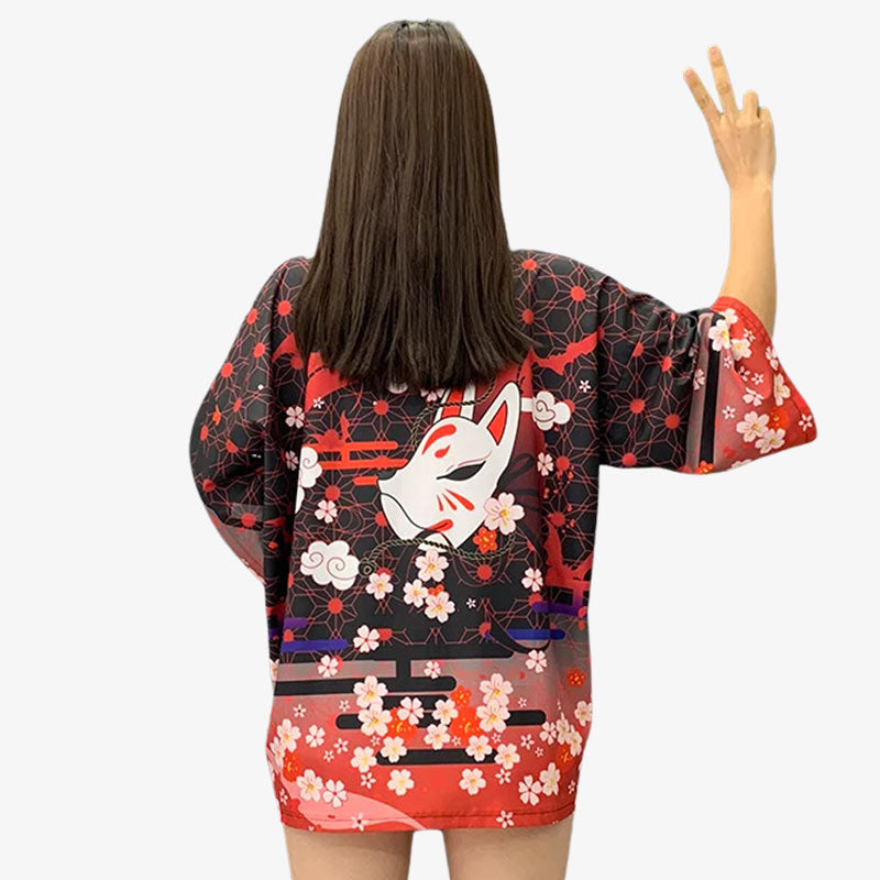 Discover the elegance of a kimono jacket for women, blending traditional Japanese style with modern versatility for a chic outerwear optionKimono haori with kitsune mask pattern with sakura white flowers printed